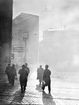 Archival photo of smokey downtown Pittsburgh street