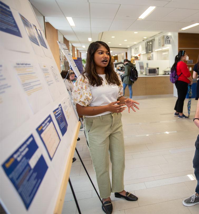 Student presenting research