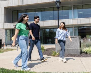 students walking out front