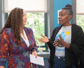 two attendees in discussion