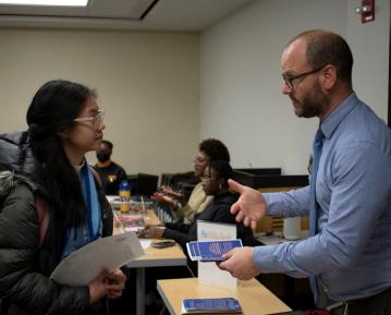 staff giving student information 