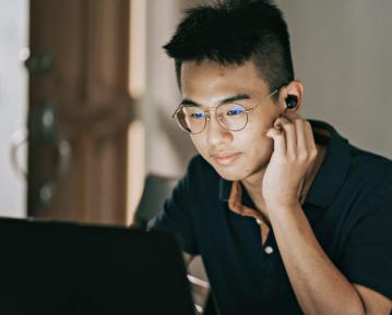 Student sitting in front of computer