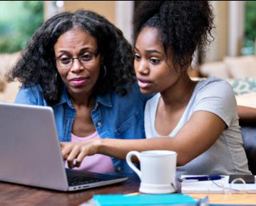 Parent and prospective student on laptop