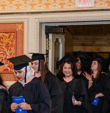 students in line at graduation