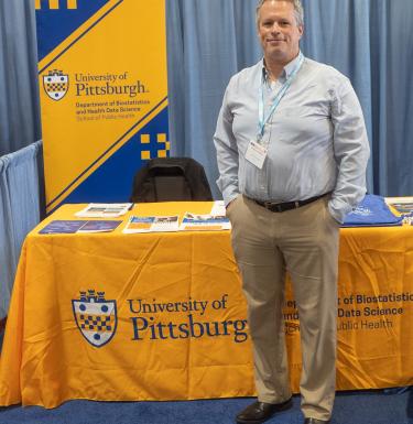 Landsittel at the Pitt booth at 2025 JSM meeting in Nashville TN