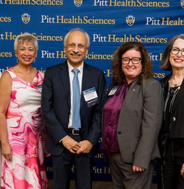Dr. Maureen Lichtveld and Dr. Anantha Shekhar with other Health Sciences school deans