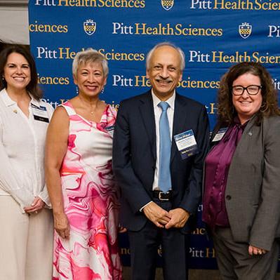 Dr. Maureen Lichtveld and Dr. Anantha Shekhar with other Health Sciences school deans